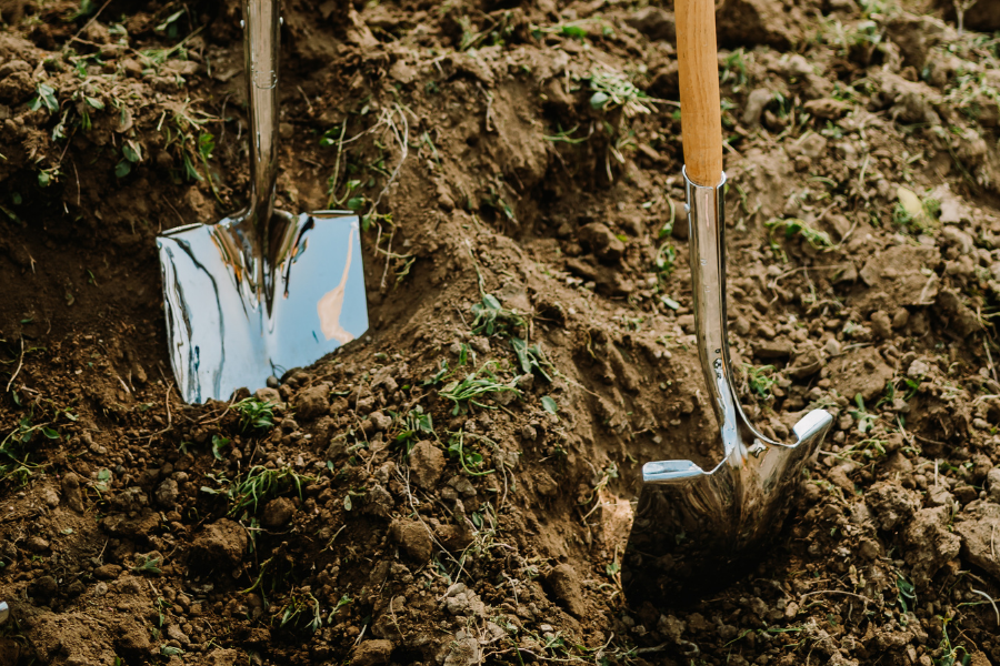 Shovels in dirt, groundbreaking