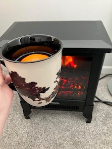 mug and fireplace