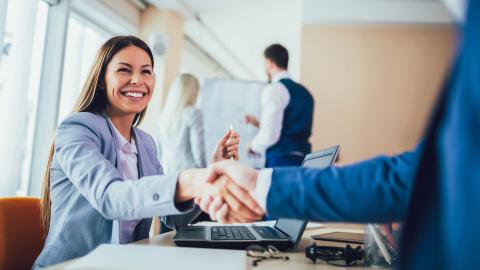 Woman Shaking Hands