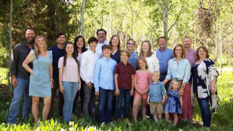 Family group photo outdoors.