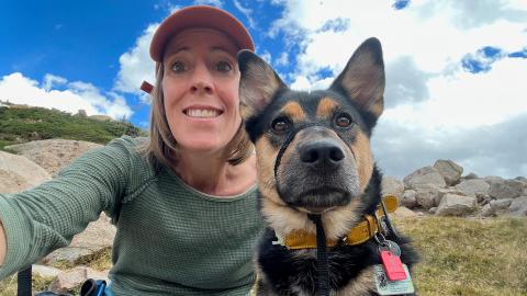 Woman and dog hiking