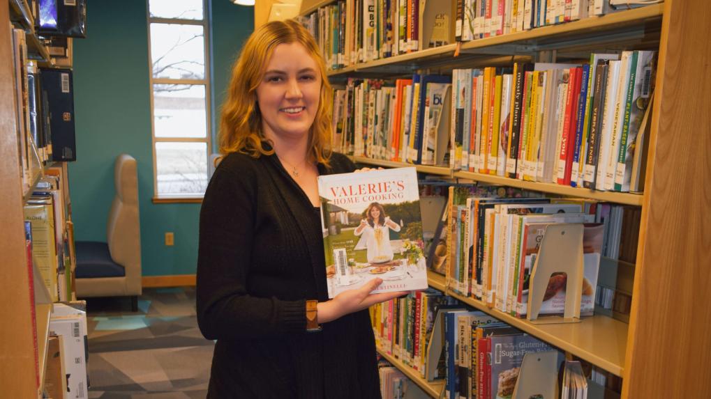 Sarah Strawn holding a book