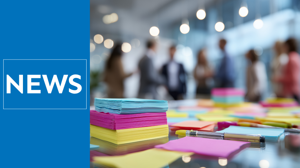 News Article Hero Image Featuring Colorful Sticky Notes and a Pen Lie on a Glass Table with Blurry Business Executives Meeting in the Background, Concept for Strategic Project Planning, Creative Development and Team Collaboration