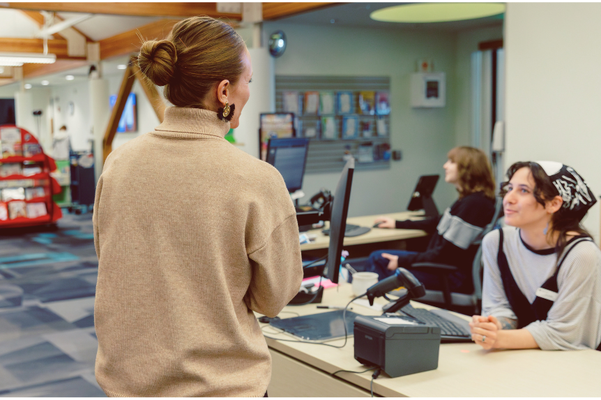 Library Director talking with Customer Service Staff at the Windsor Library