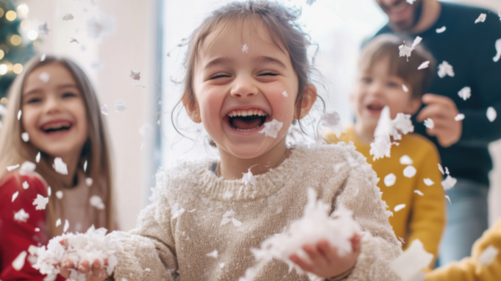Children smiling in snow.