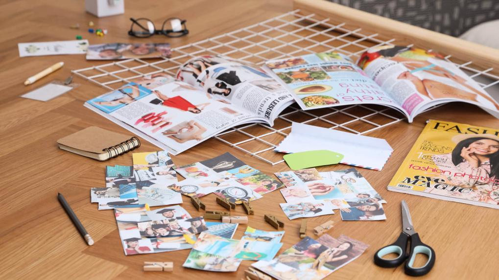 Crafting supplies and magazine cutouts. 