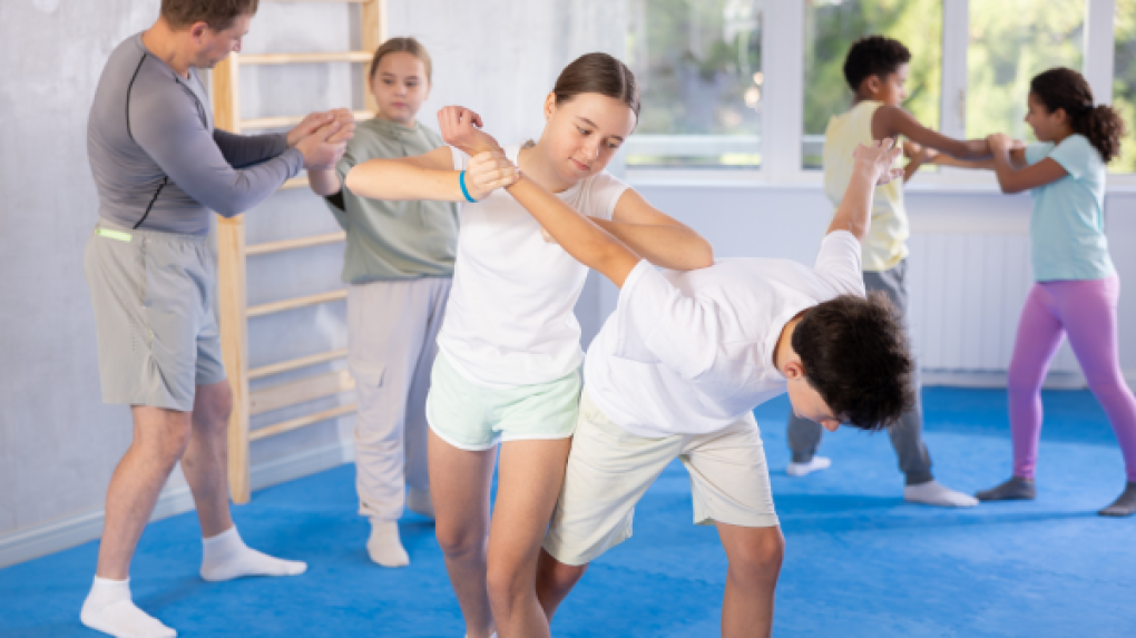 Teens practicing self-defense